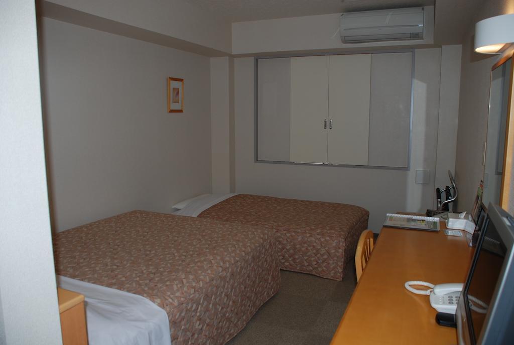 Best Inn Uozu Zimmer foto