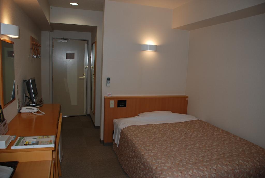 Best Inn Uozu Zimmer foto